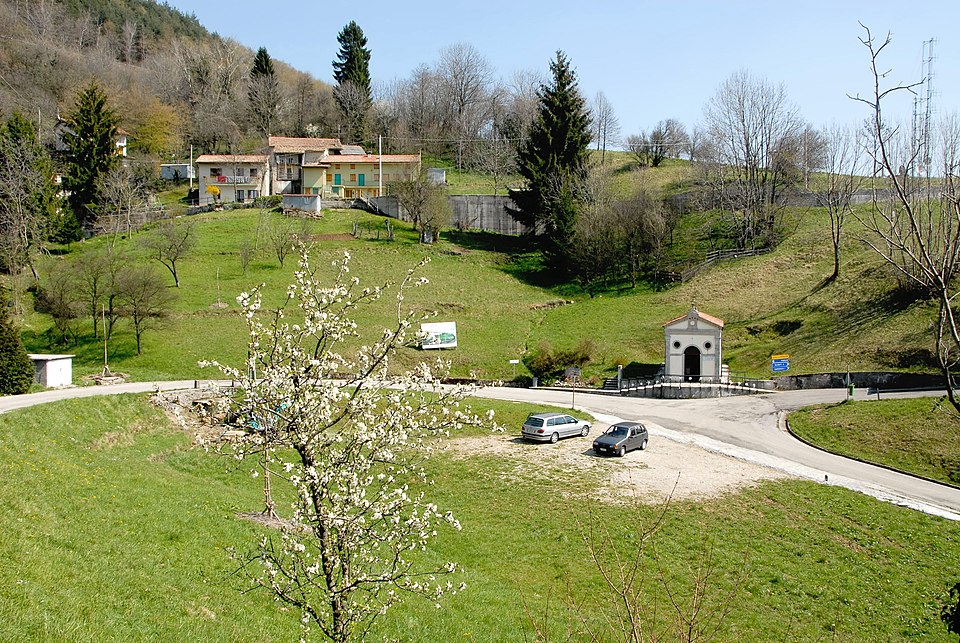 Dolina with Marian chapel in a natural karst sinkhole near the hamlet of Porzûs, Attimis