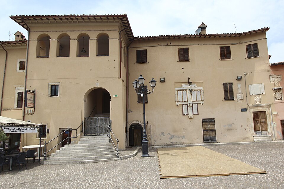 The old Palazzo Comunale of Cerreto di Spoleto, a stone communal palace in the historic centre